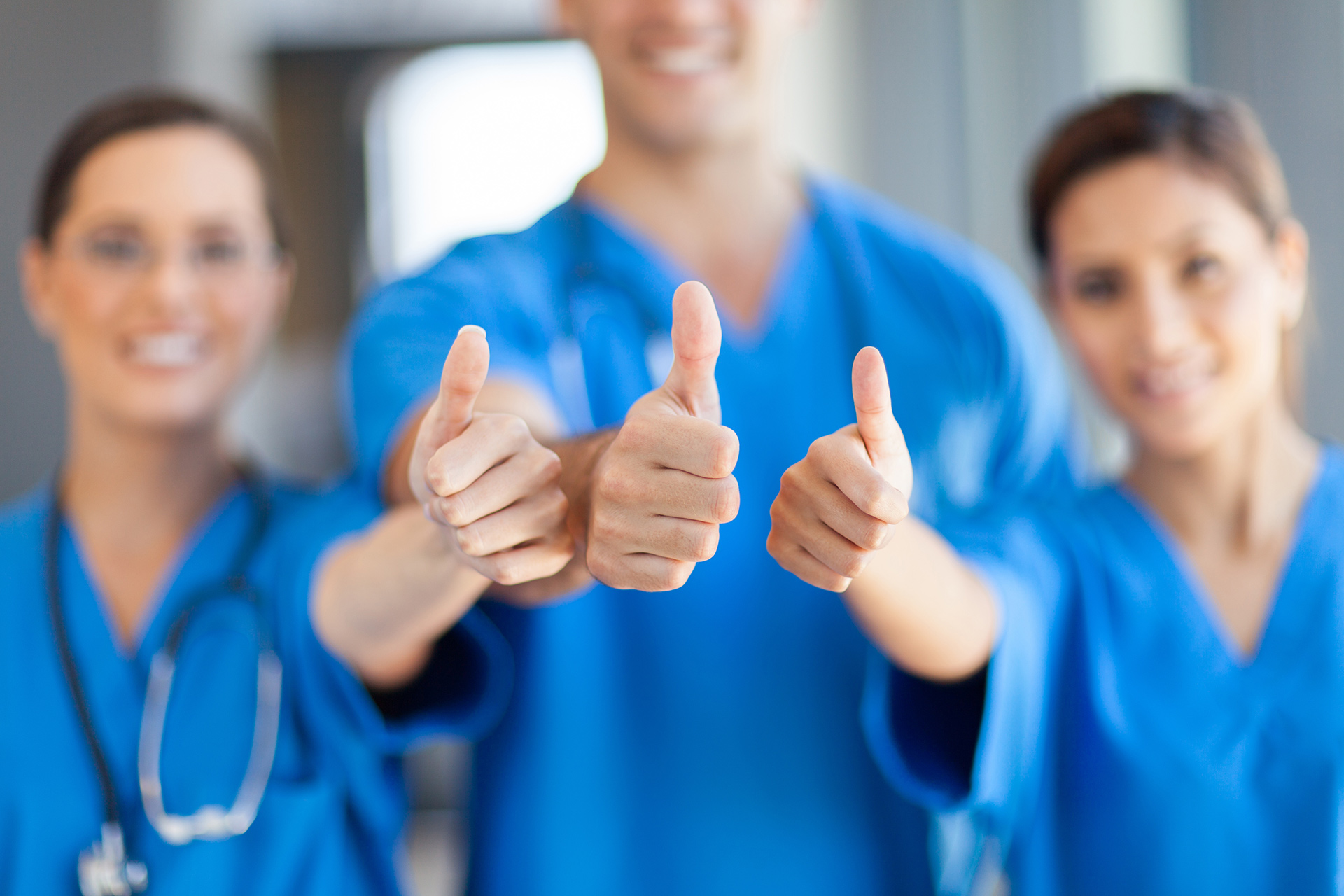 Thumbs-up-healthcare-workers-1920